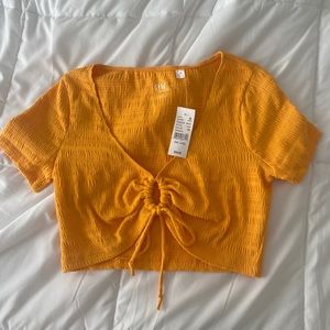 Orange PacSun crop top